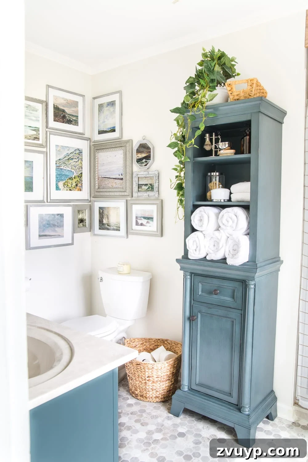 Budget Master Bath Glow-Up Unveiled 19 Budget Master Bathroom Refresh Reveal: Linen cabinet integrated into the corner gallery wall design.