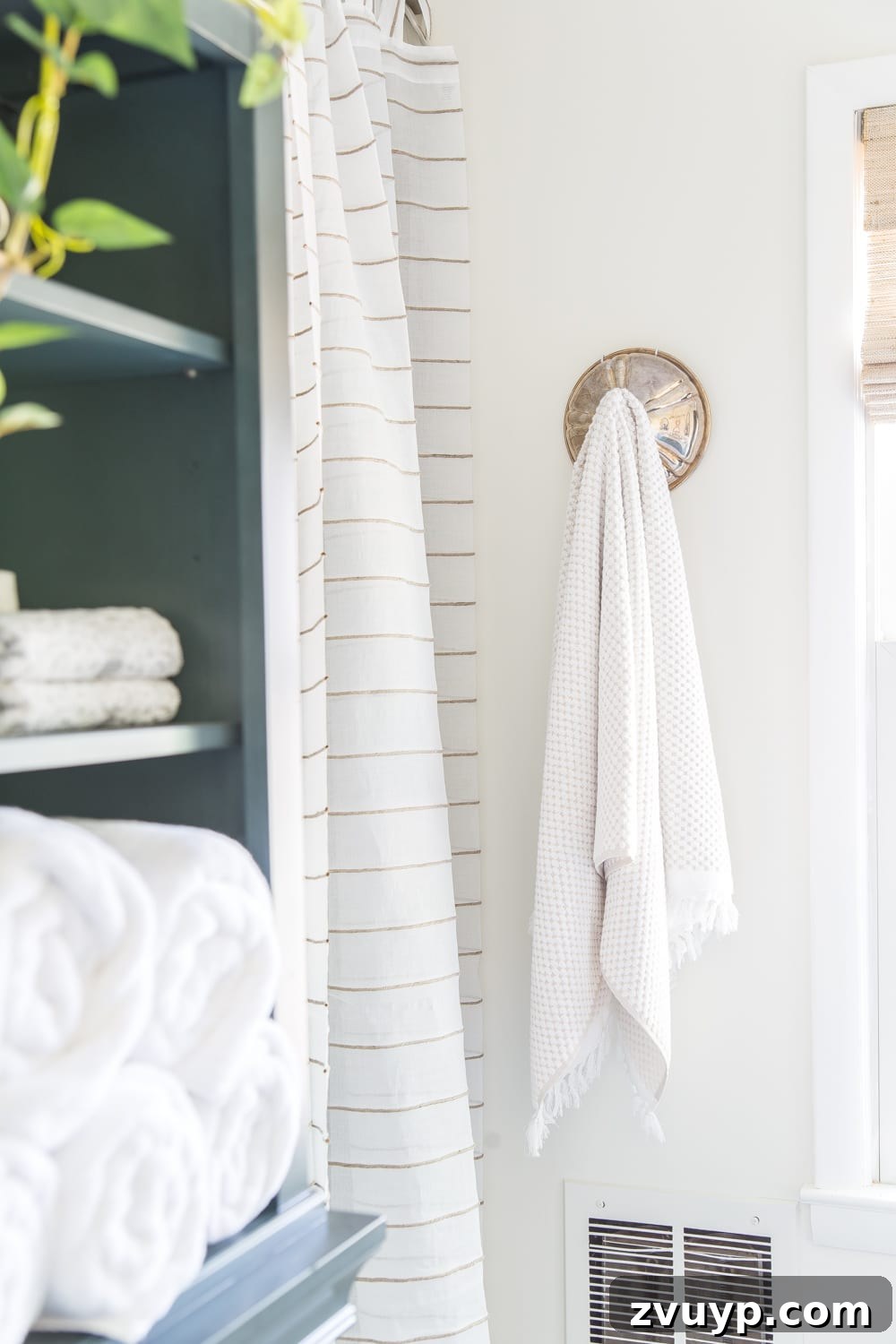 Budget Master Bath Glow-Up Unveiled 26 Budget Master Bathroom Refresh Reveal: Creative towel hooks made from repurposed chafing dish lids.