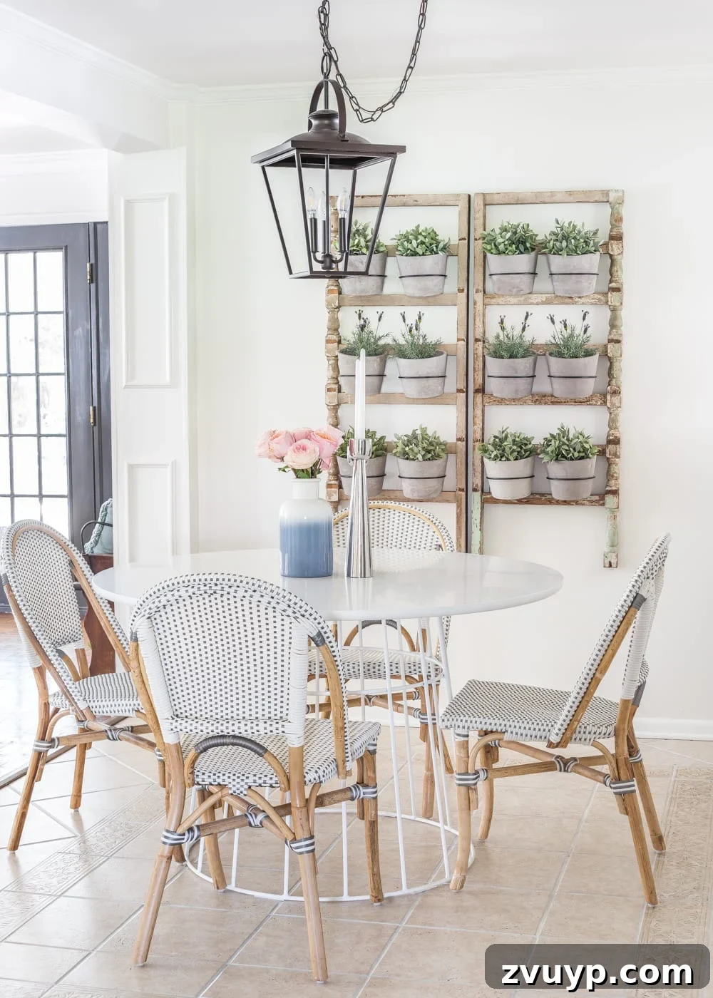Blooming and Bright: Our Spring Home Reveal 11 Simple Spring Home Tour | Breakfast nook informal dining with French bistro chairs and wall planter made from antique banisters