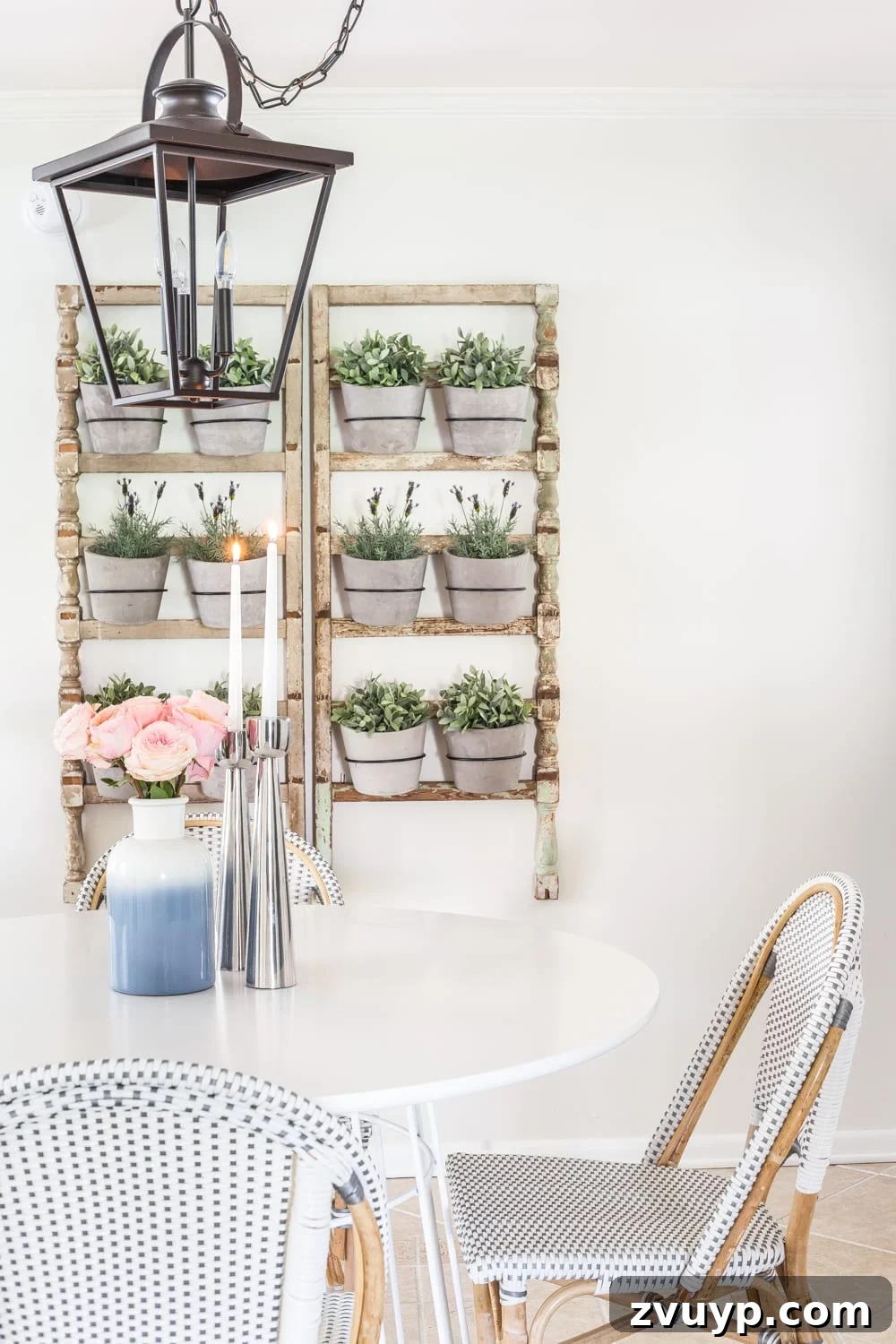 Blooming and Bright: Our Spring Home Reveal 12 Simple Spring Home Tour | Breakfast nook informal dining with French bistro chairs and wall planter made from antique banisters