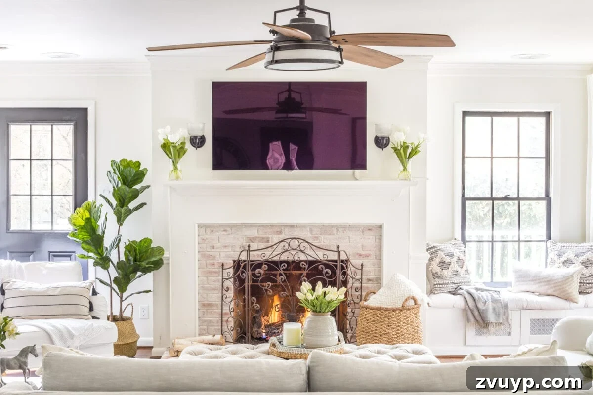Blooming and Bright: Our Spring Home Reveal 13 Simple Spring Home Tour | Neutral living room decorated with small floral touches for spring