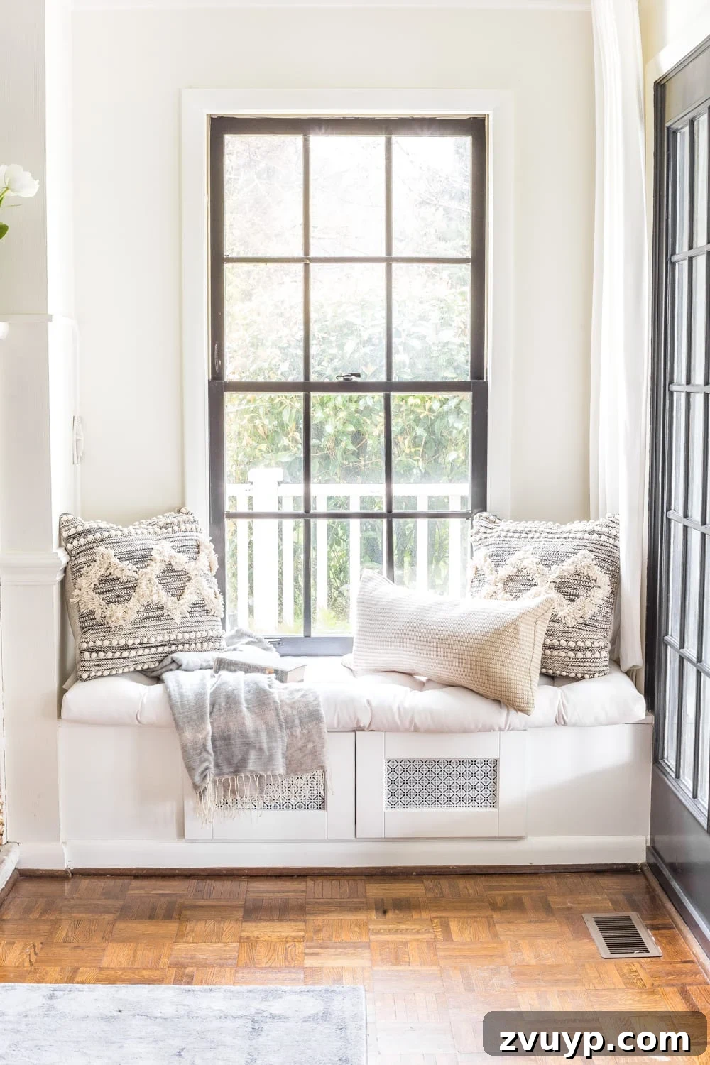 Blooming and Bright: Our Spring Home Reveal 15 Simple Spring Home Tour | Neutral living room decorated with small floral touches for spring