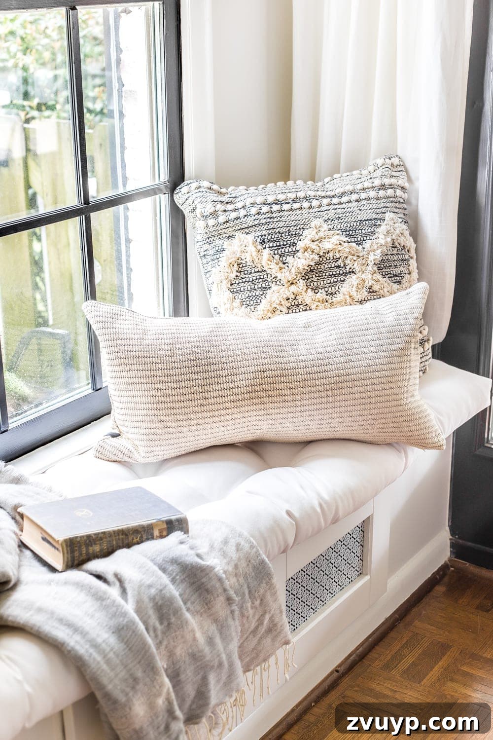 Blooming and Bright: Our Spring Home Reveal 16 Simple Spring Home Tour | Neutral living room decorated with small floral touches for spring