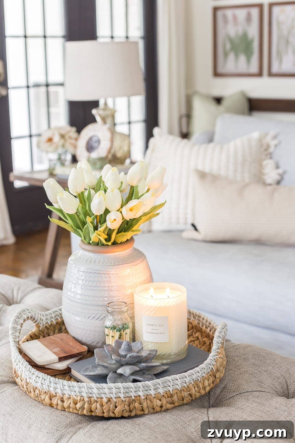 Blooming and Bright: Our Spring Home Reveal 17 Simple Spring Home Tour | Neutral living room decorated with small floral touches for spring
