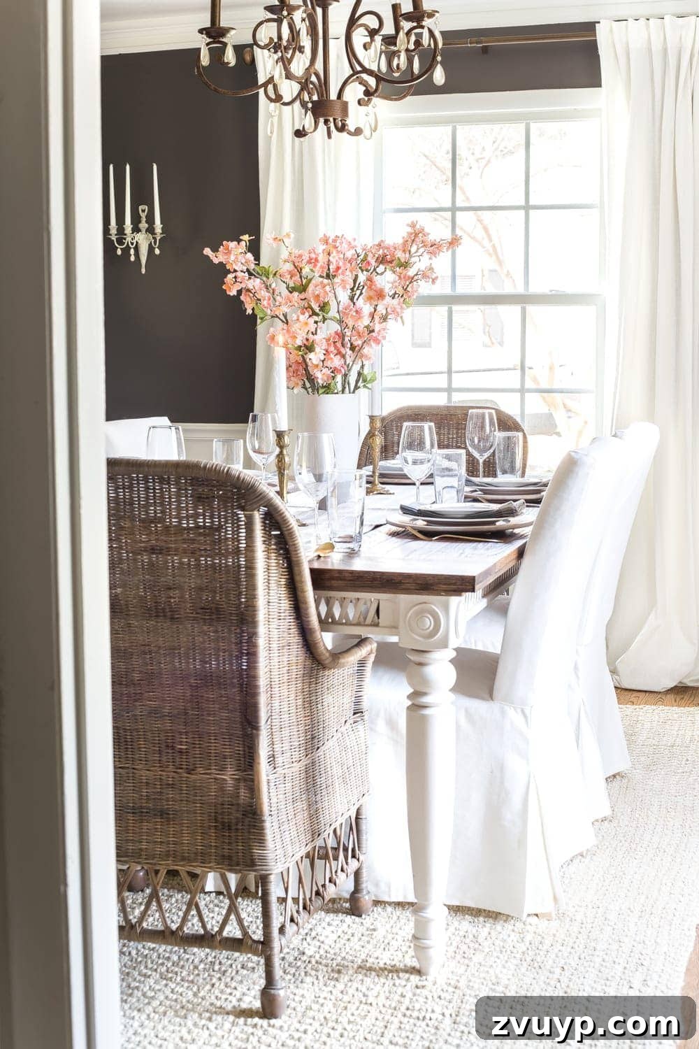Blooming and Bright: Our Spring Home Reveal 3 Simple Spring Home Tour | Faux cherry blossoms as a simple dining table centerpiece