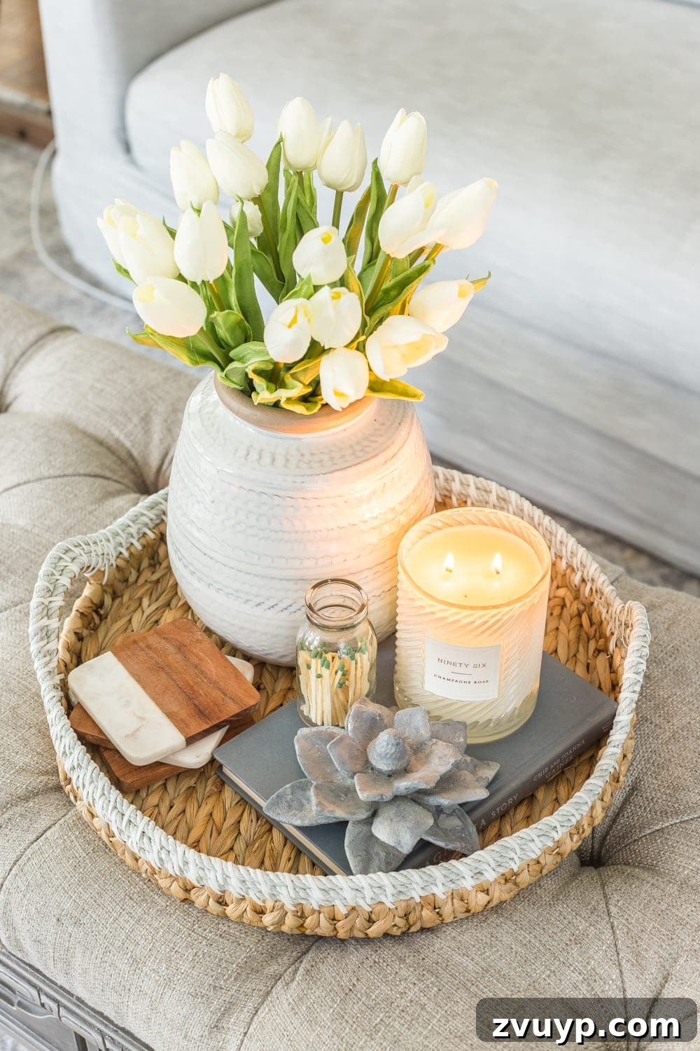 Blooming and Bright: Our Spring Home Reveal 18 Simple Spring Home Tour | Spring coffee table decor with artificial white tulips