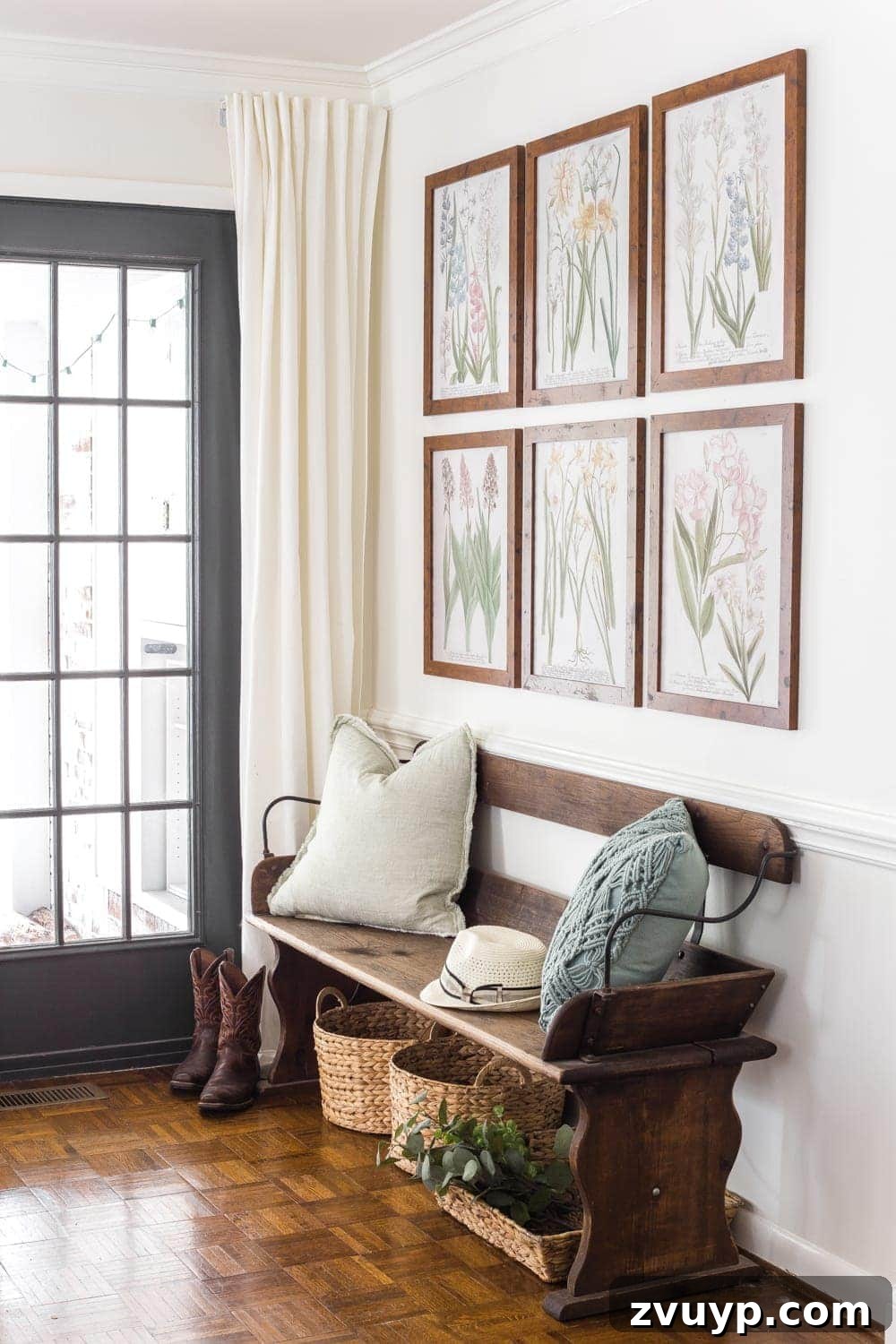 Blooming and Bright: Our Spring Home Reveal 20 Simple Spring Home Tour | Craigslist bench with baskets underneath for a makeshift mud room and free botanical prints for spring.