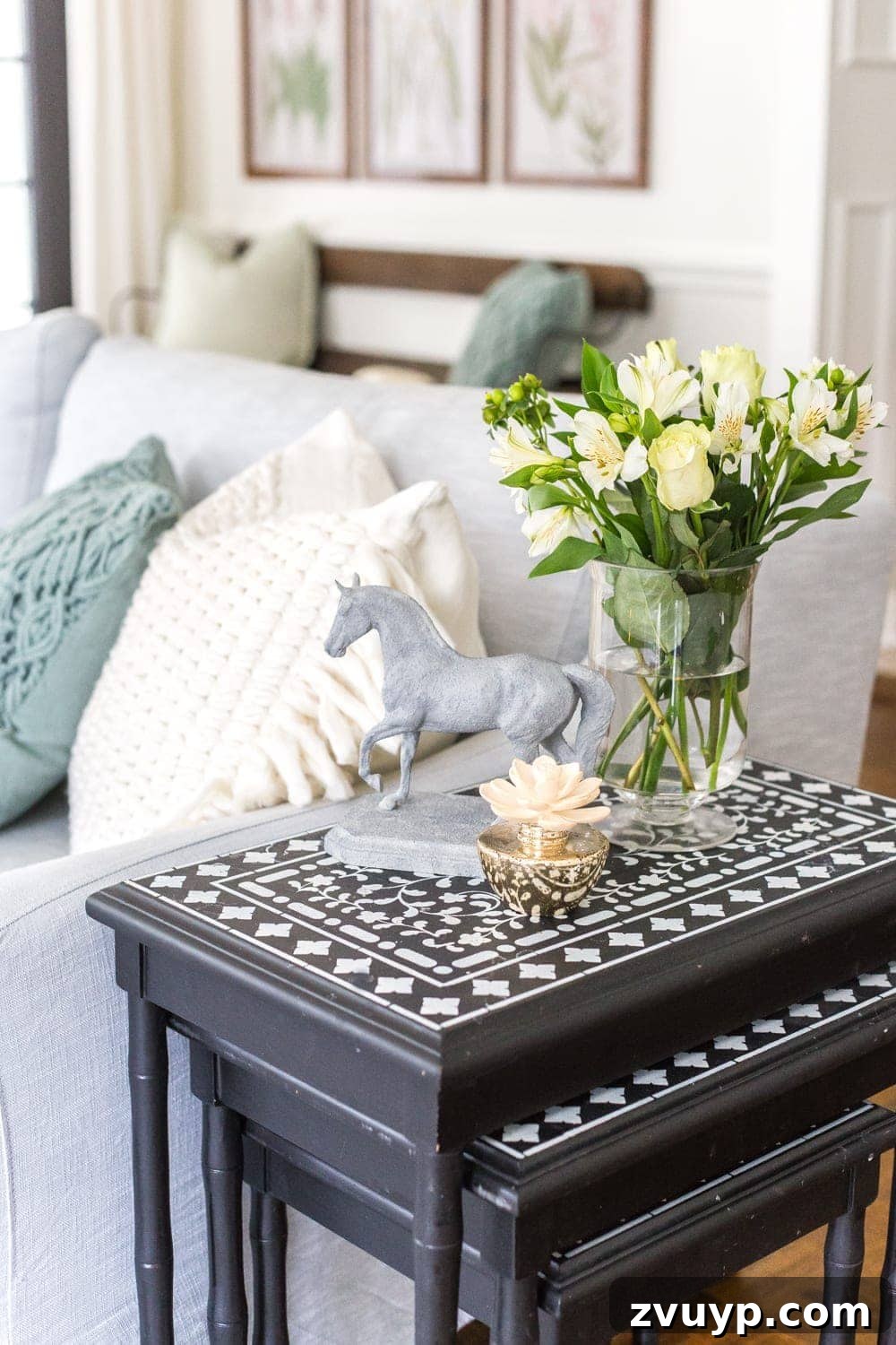 Blooming and Bright: Our Spring Home Reveal 23 Simple Spring Home Tour | Neutral living room with artificial florals and small spring touches.