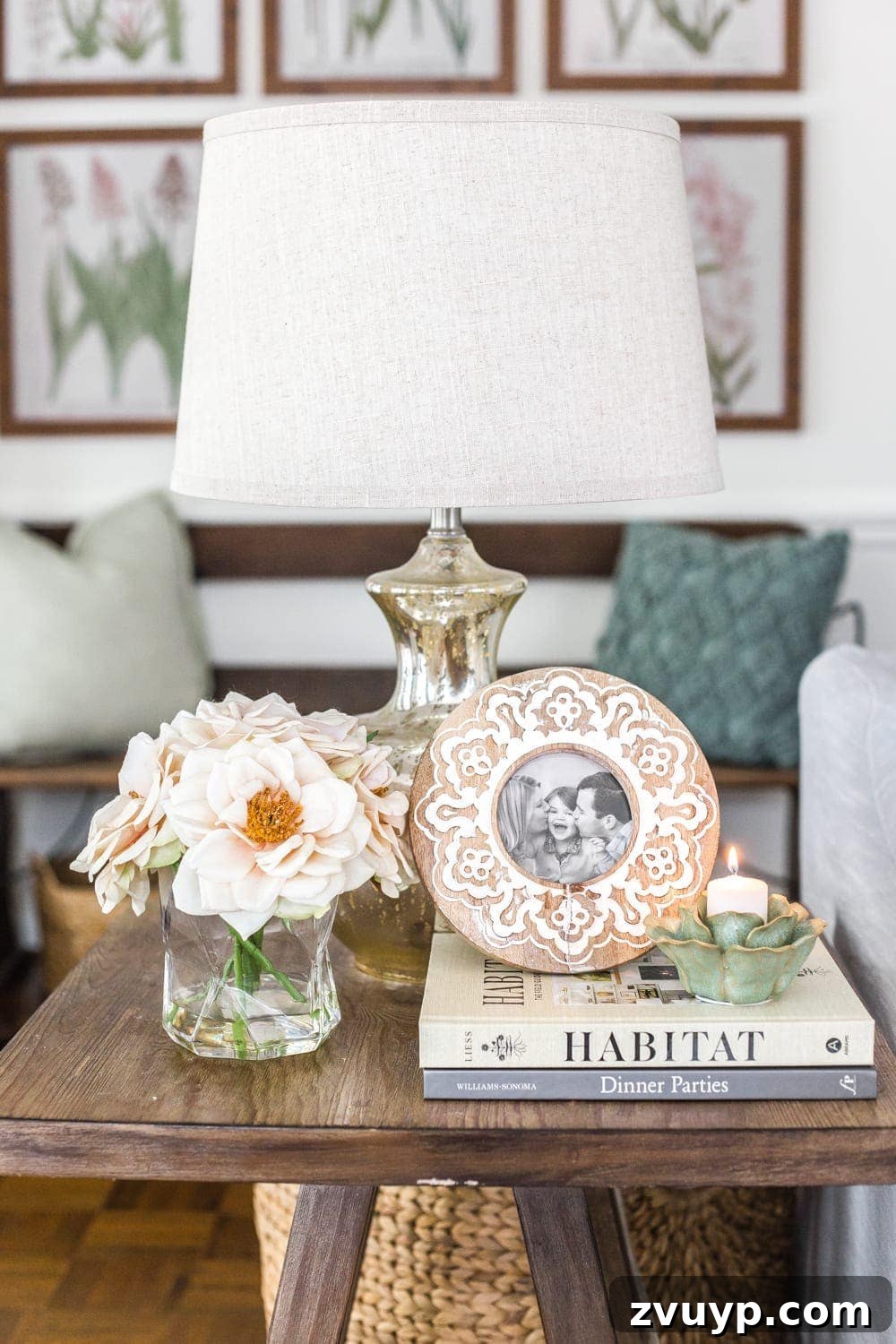 Blooming and Bright: Our Spring Home Reveal 24 Simple Spring Home Tour | Neutral living room end table with artificial florals and small spring touches.