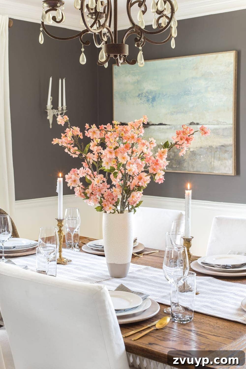 Blooming and Bright: Our Spring Home Reveal 5 Simple Spring Home Tour | Faux cherry blossoms as a simple dining table centerpiece
