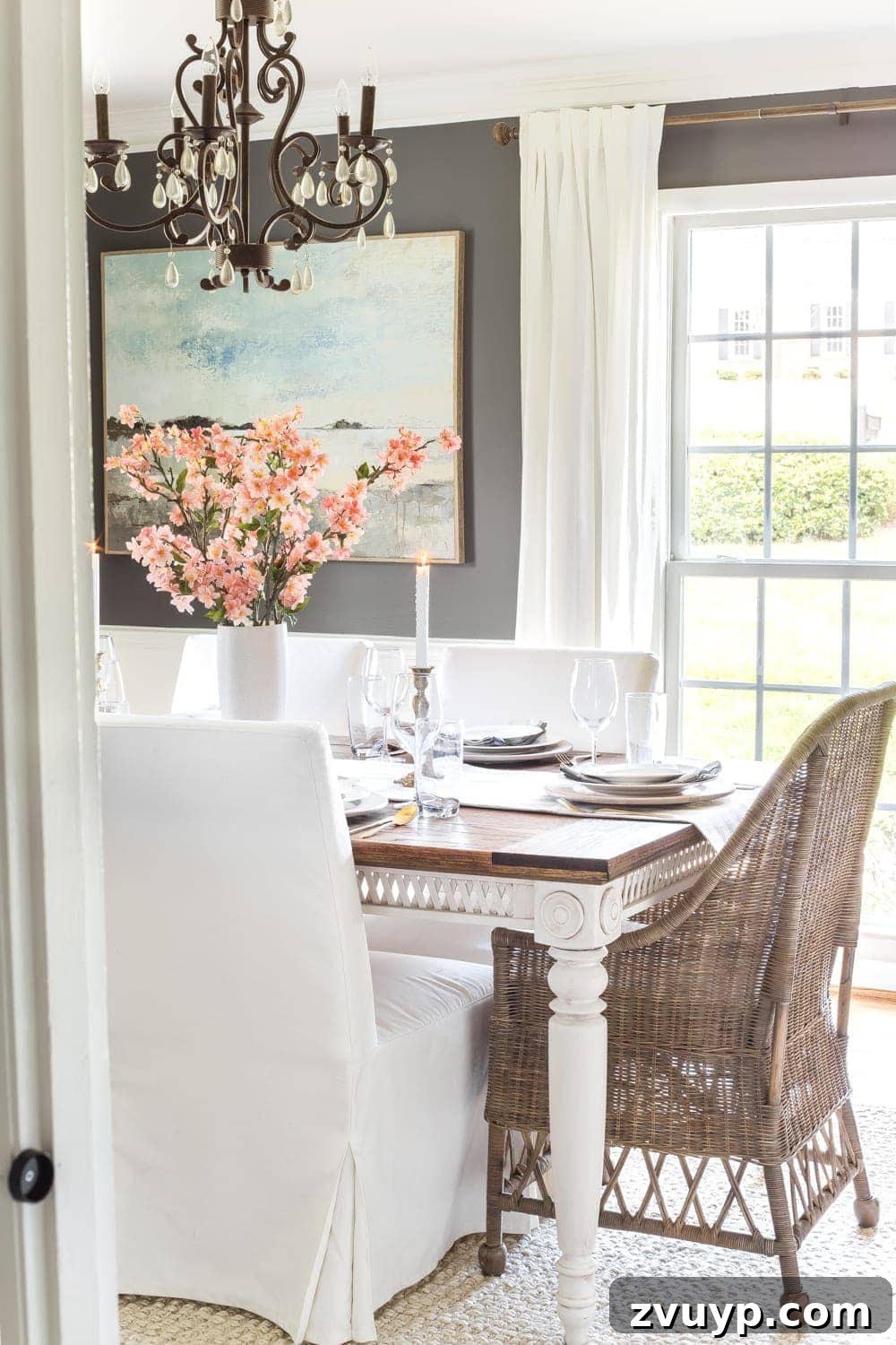 Blooming and Bright: Our Spring Home Reveal 6 Simple Spring Home Tour | Faux cherry blossoms as a simple dining table centerpiece