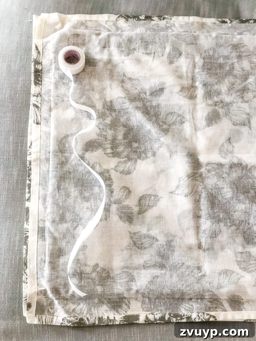 3 Clever Ways to Upcycle Household Items into DIY Throw Pillows 5 How to turn cloth napkins into throw pillows with the no-sew method, showing fabric placement.