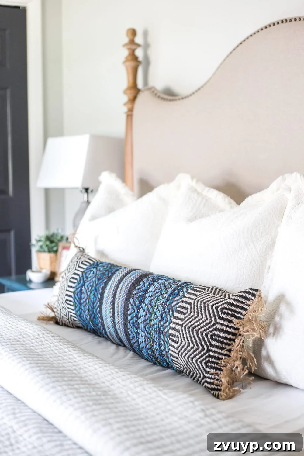3 Clever Ways to Upcycle Household Items into DIY Throw Pillows 10 A finished DIY no-sew throw pillow made from a repurposed rug, perfect for a king-sized bed.