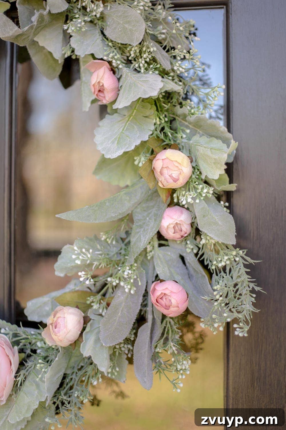 Handcrafted Sage and Blush Spring Wreath 10 Close-up of the delicate blush flowers and sage greenery on the DIY spring wreath.