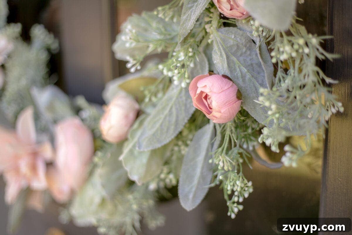 Handcrafted Sage and Blush Spring Wreath 11 Beautifully arranged sage greenery and blush flowers on a handmade spring wreath, showcasing romantic style.