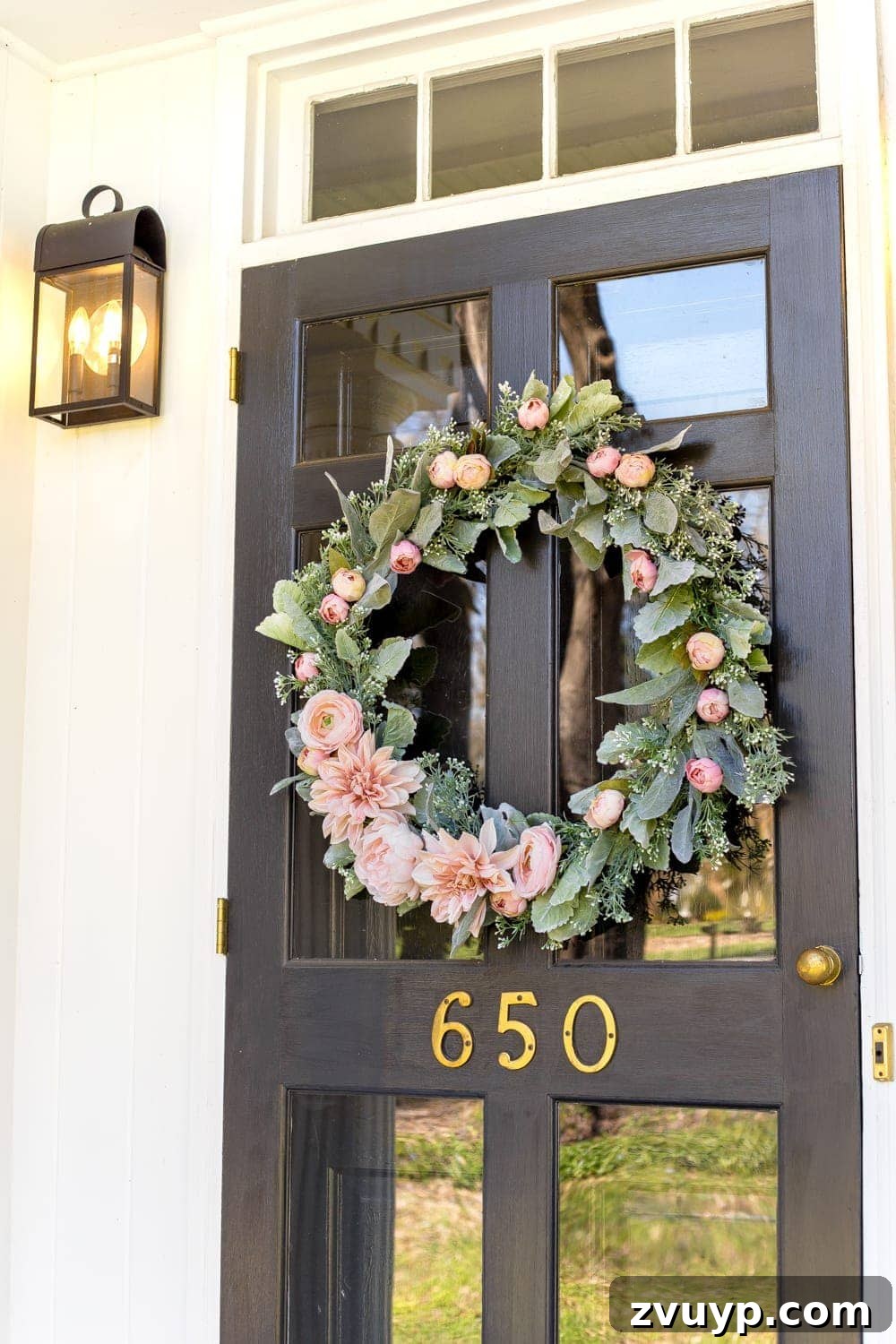 Handcrafted Sage and Blush Spring Wreath 13 DIY Sage and Blush Spring Wreath on a welcoming front porch, decorated for the spring season.