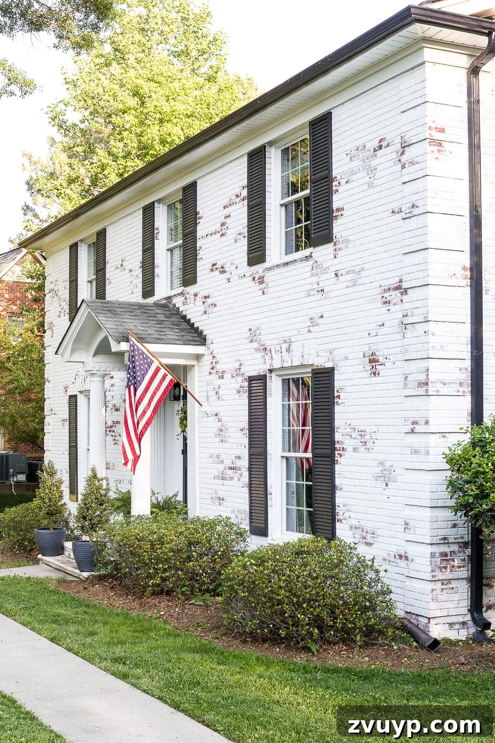 Your Questions Answered: Limewashed Brick and Country Living Magazine 6 FAQs About Our Limewashed Brick | All of our frequently asked questions about our limewashed brick concerning neighbors' opinions, trends, DIY-ability, and why we chose it over paint. #limewash #brickexterior #limewashedbrick #brickpaint #paintedbrick #exteriormakeover #curbappeal #brickhouse