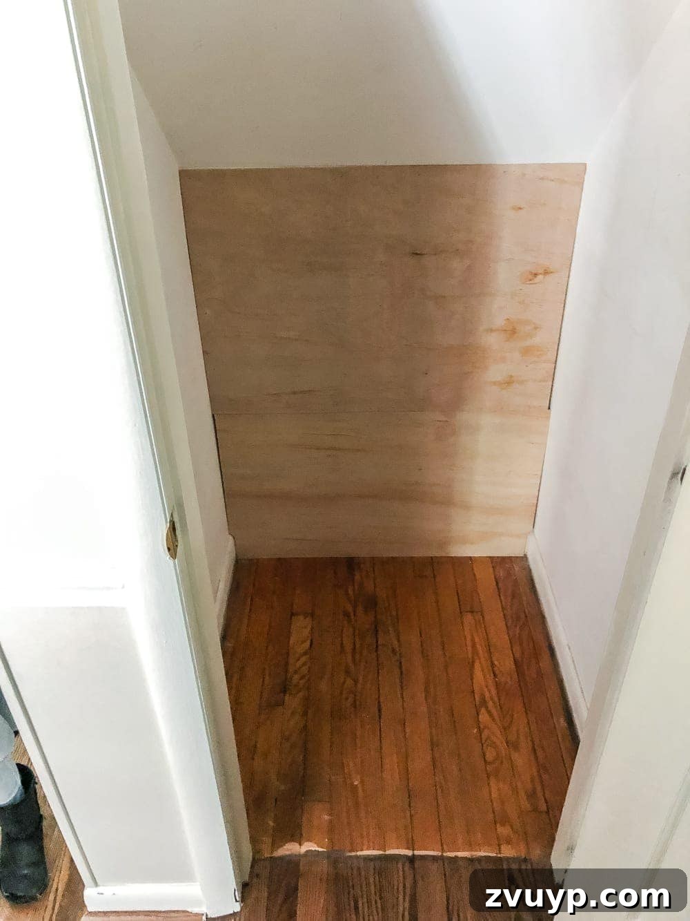 Handcrafted Film Collection Cabinet 5 Installing plywood for a closet wall
