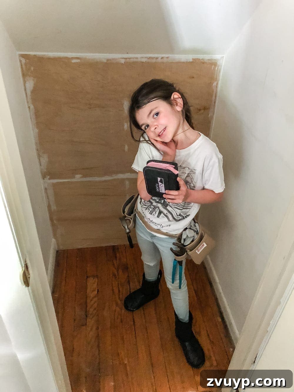 Handcrafted Film Collection Cabinet 6 Caulking seams in a DIY closet