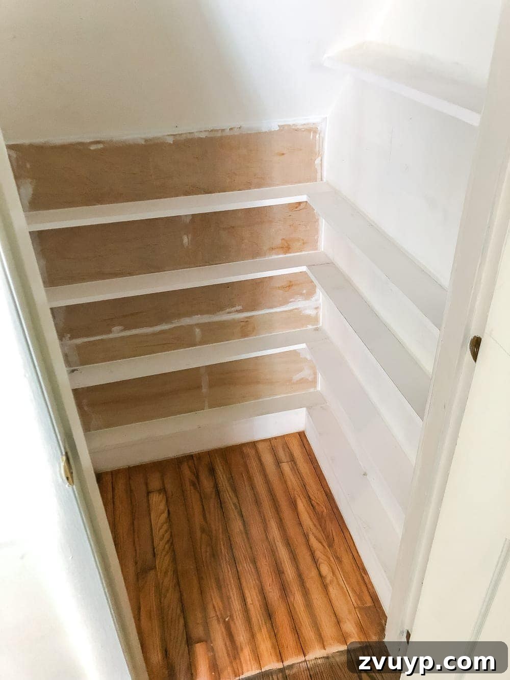 Handcrafted Film Collection Cabinet 8 Installing custom DVD shelves with L-brackets
