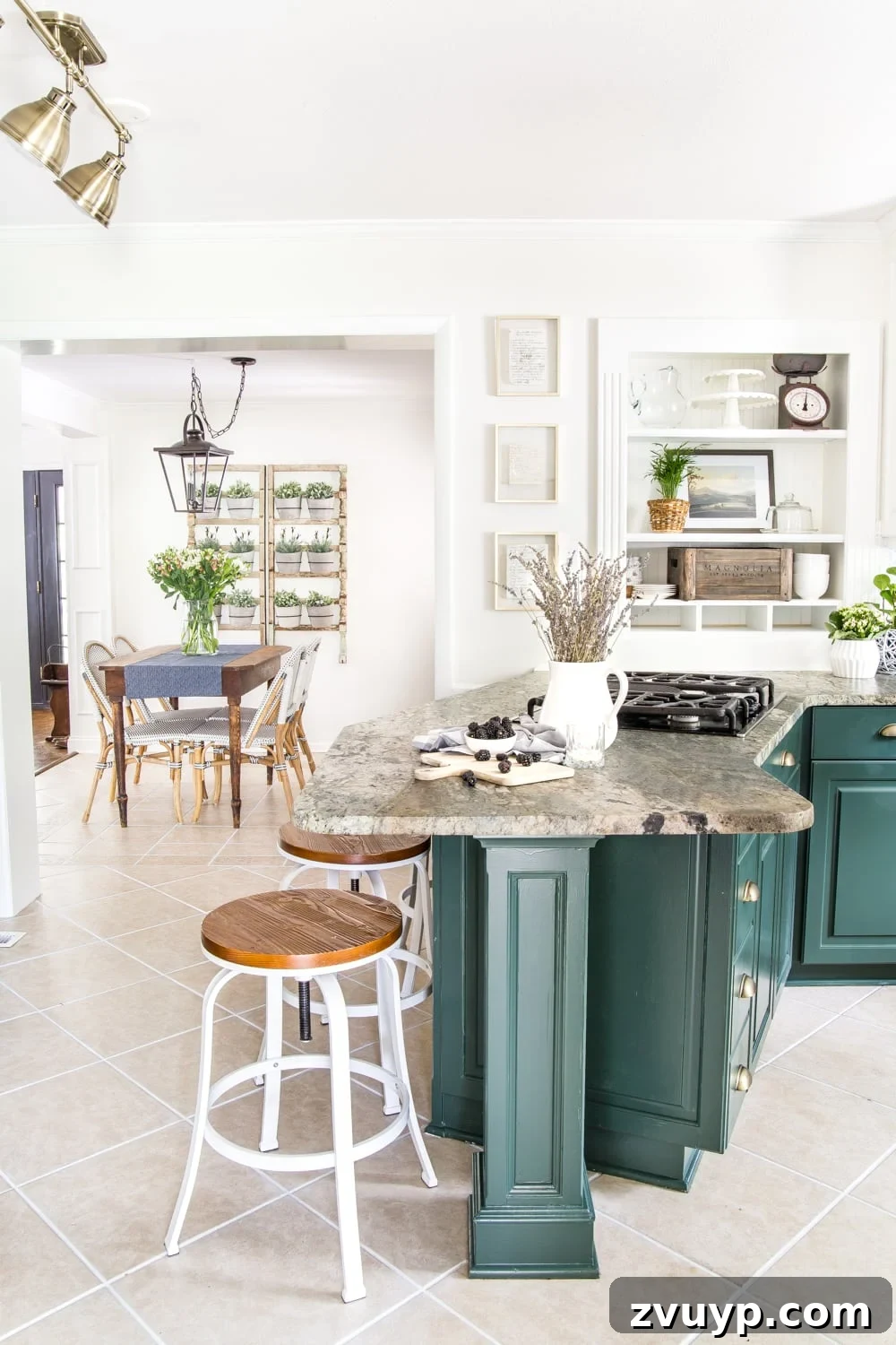 Our Home's Two Year Evolution A Before and After Tour 14 Detailed view of the kitchen's lower cabinets painted in Sherwin Williams Billiard, contrasting beautifully with the upper white cabinets and subway tile backsplash.
