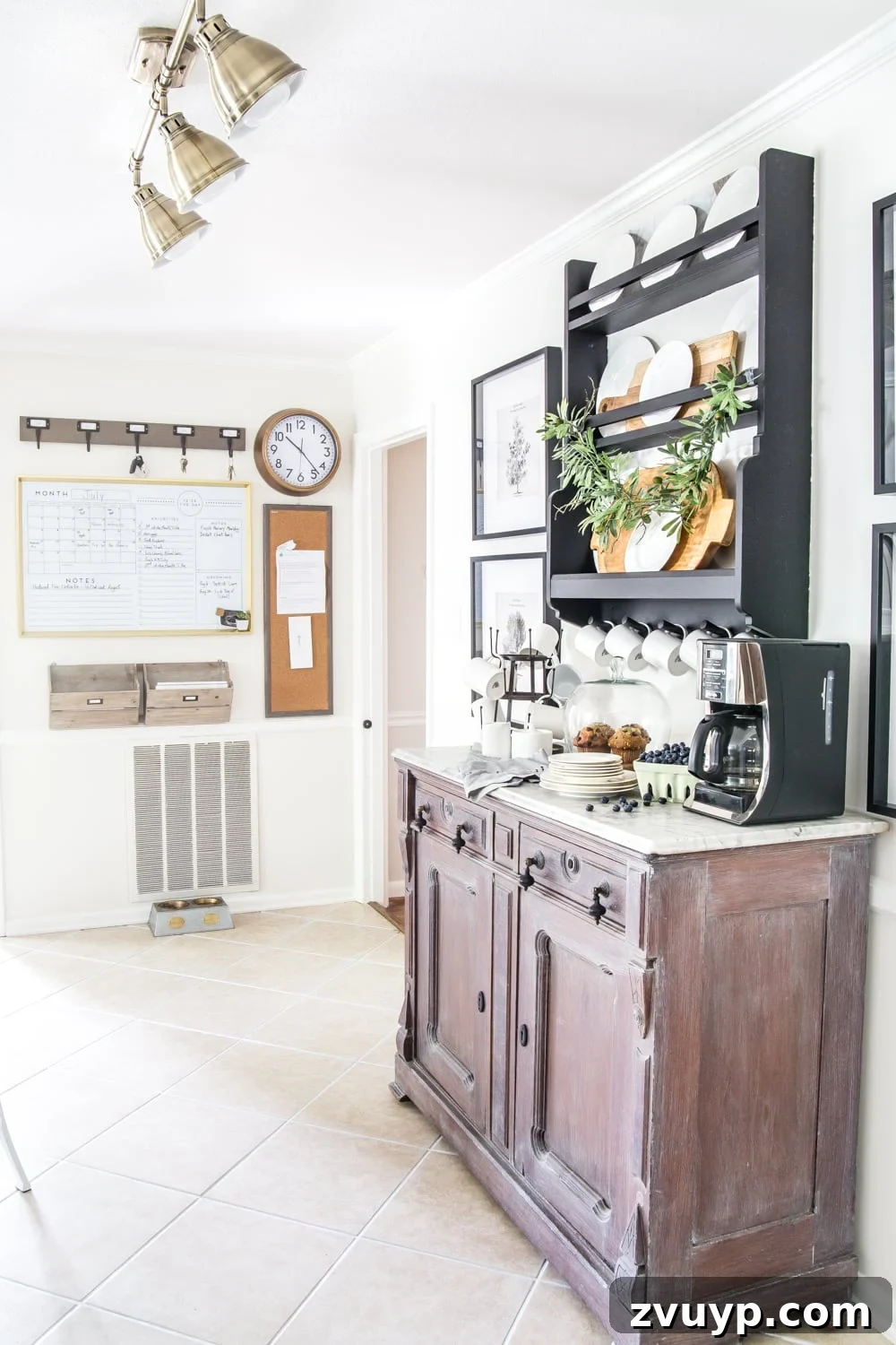 Our Home's Two Year Evolution A Before and After Tour 15 Another perspective of the kitchen, showcasing the open shelving, decorative elements, and the seamless integration of modern and farmhouse styles.