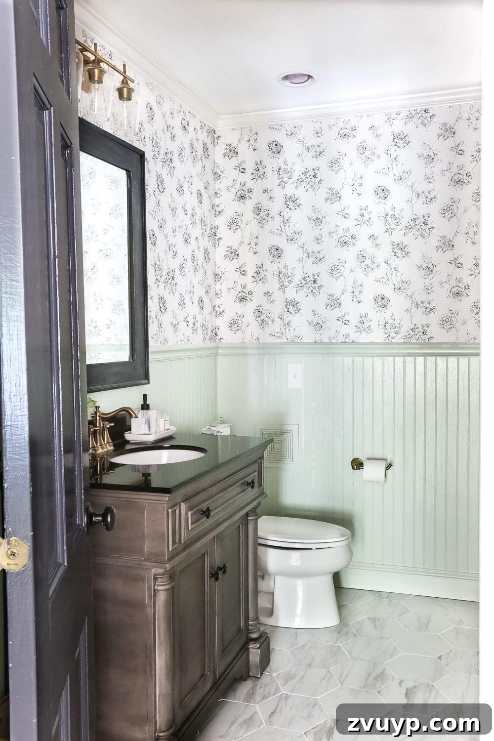 Our Home's Two Year Evolution A Before and After Tour 26 After shot of the Aqua Meets Urban Powder Room, showcasing the unique beadboard color and stylish urban accents.