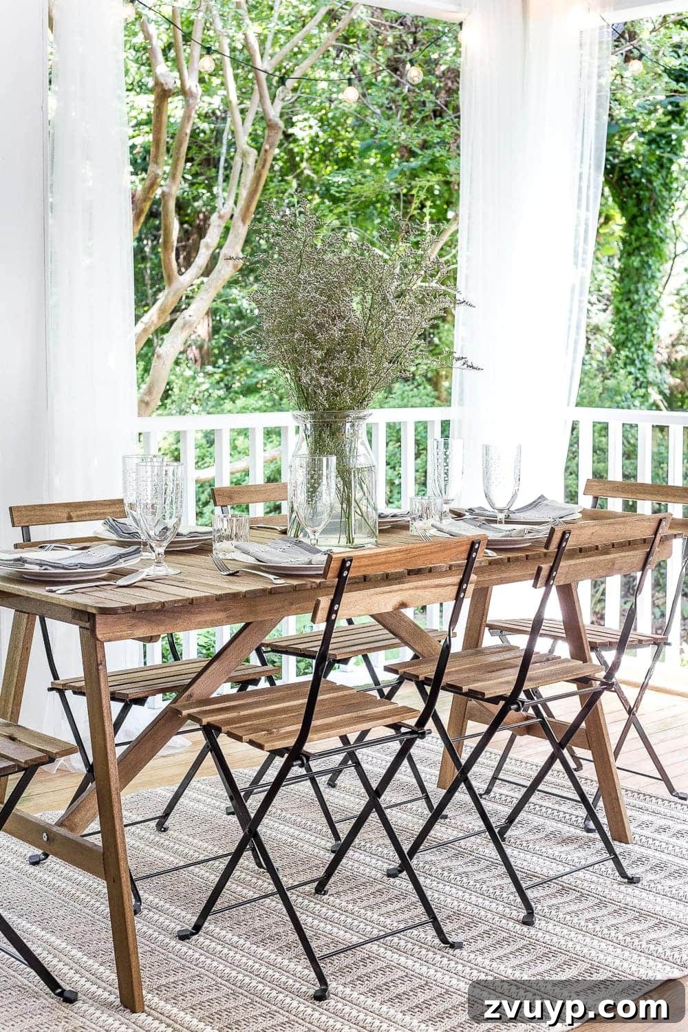 Our Home's Two Year Evolution A Before and After Tour 65 Detailed view of the summer back porch decor, including patterned pillows and a small outdoor table, adding color and texture.