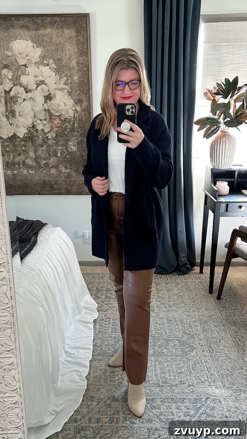 Smooth Silhouette: 10 Fashion Tricks to Flatter Your Mom Belly 9 postpartum outfit with leather pants, tee, and cardigan