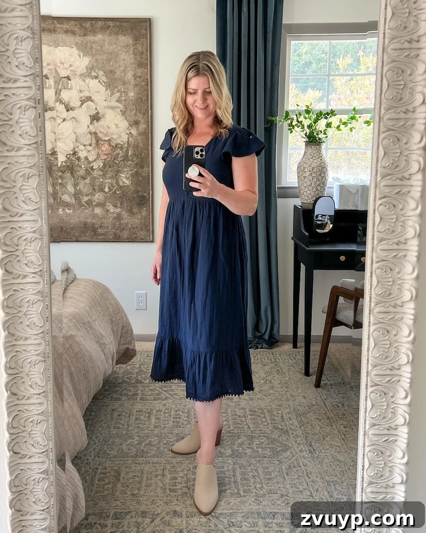 Smooth Silhouette: 10 Fashion Tricks to Flatter Your Mom Belly 6 navy blue linen midi dress postpartum outfit