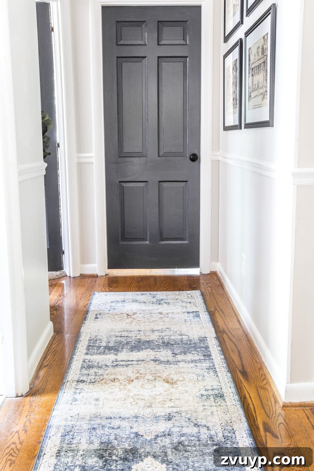 Stylish Solutions for Skinny Hallways 12 dark charcoal doors and hallway runner