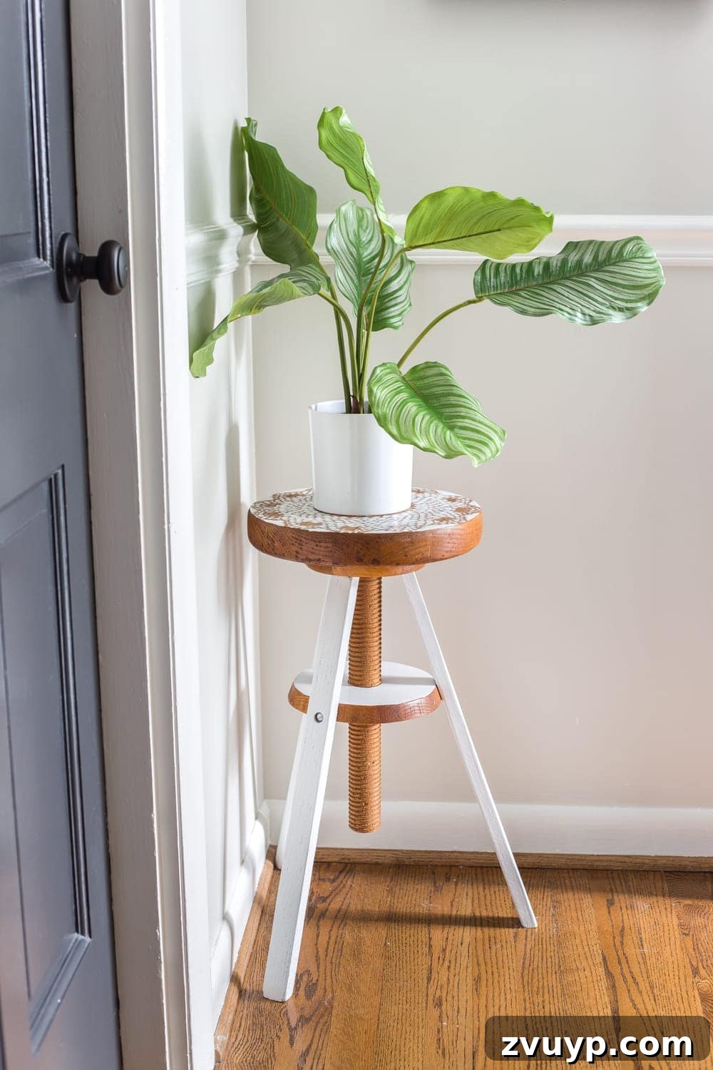 Stylish Solutions for Skinny Hallways 8 plant stand made from a thrifted piano stool