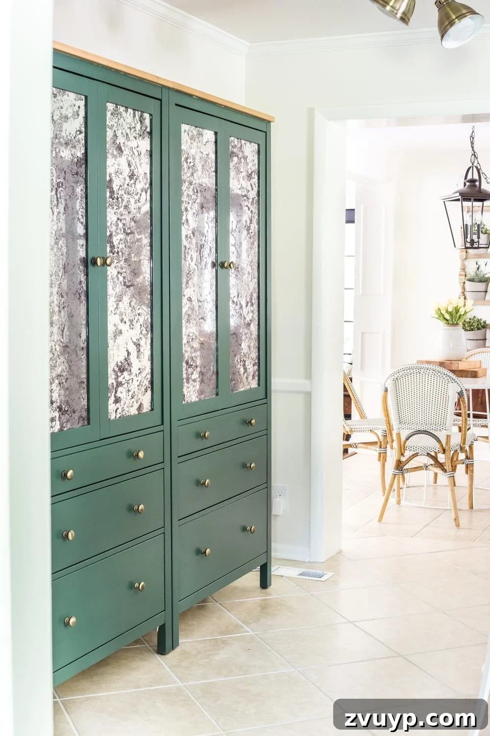 IKEA Hemnes Pantry Hack 16 Completed freestanding pantry cupboard in green with brass knobs and antique mirror glass in a kitchen setting