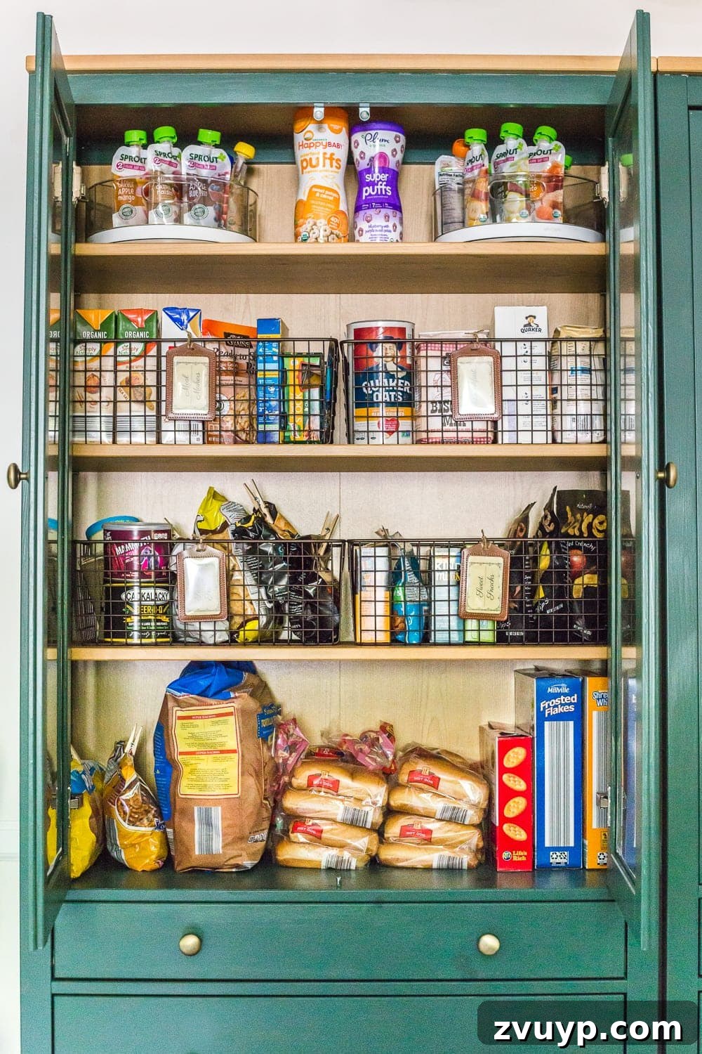 IKEA Hemnes Pantry Hack 18 Detailed pantry organization inside an IKEA cabinet hack, featuring containers and labels