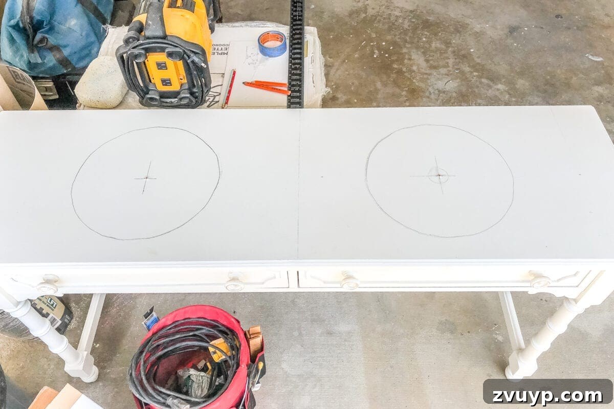 Upgrade Your Console Table to a Stunning Bathroom Vanity 9 Marking the console table surface with sink templates for precise cutouts for vessel sinks.