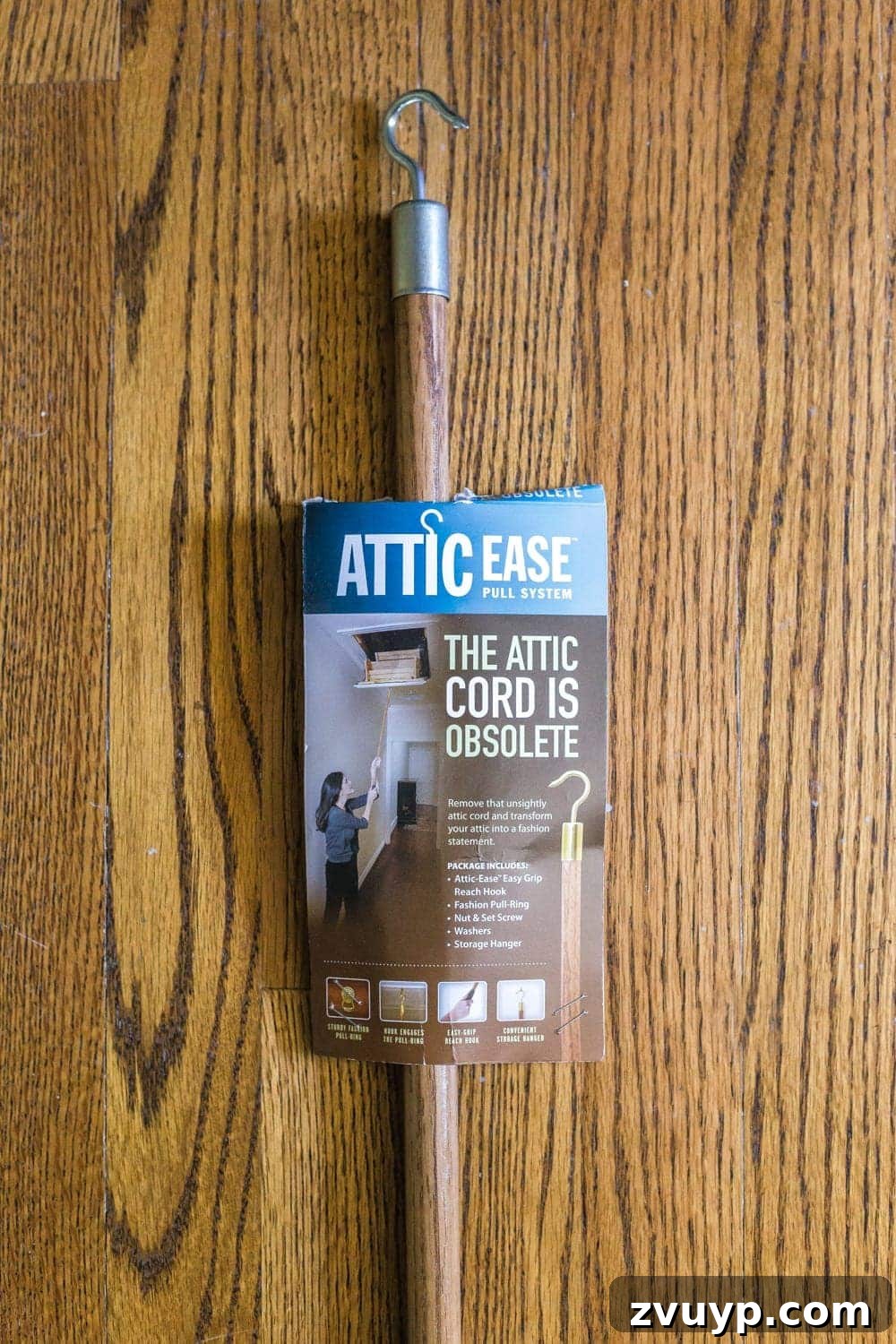 Upgrade Attic Door String to a Hook 5 Components of the Attic Ease pull system, including a discreet ring and a hook-ended pole.