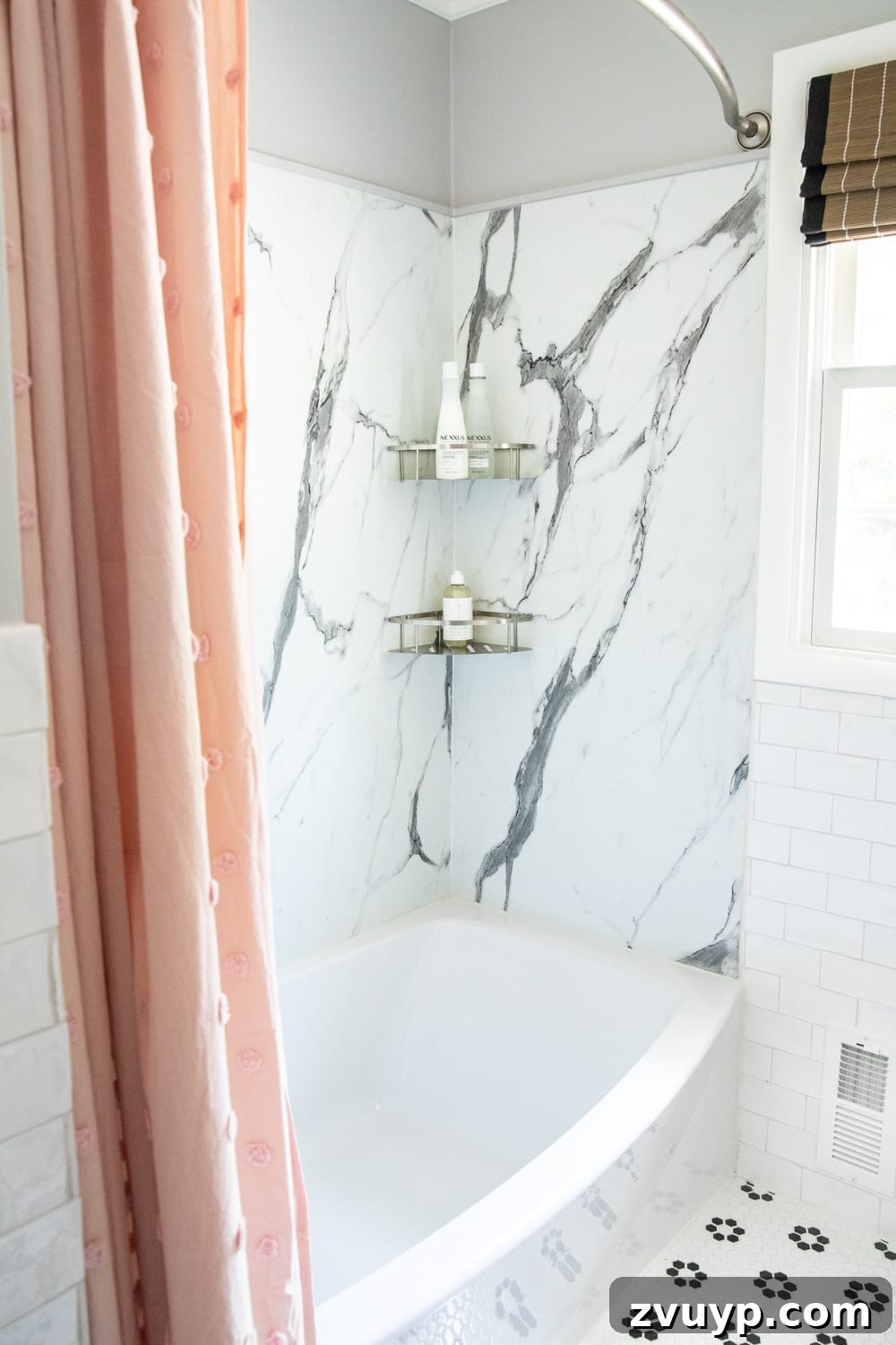 Unveiling the Ultimate Kids Bathroom Makeover 12 Spacious Ovation tub alongside faux marble shower walls for kids bathroom