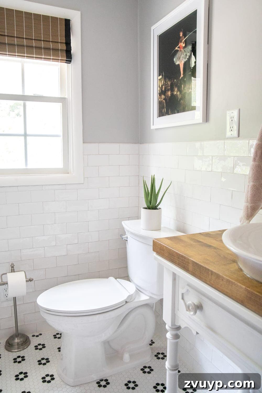 Unveiling the Ultimate Kids Bathroom Makeover 17 Self-cleaning VorMax toilet next to charming handmade subway tile in kids bathroom