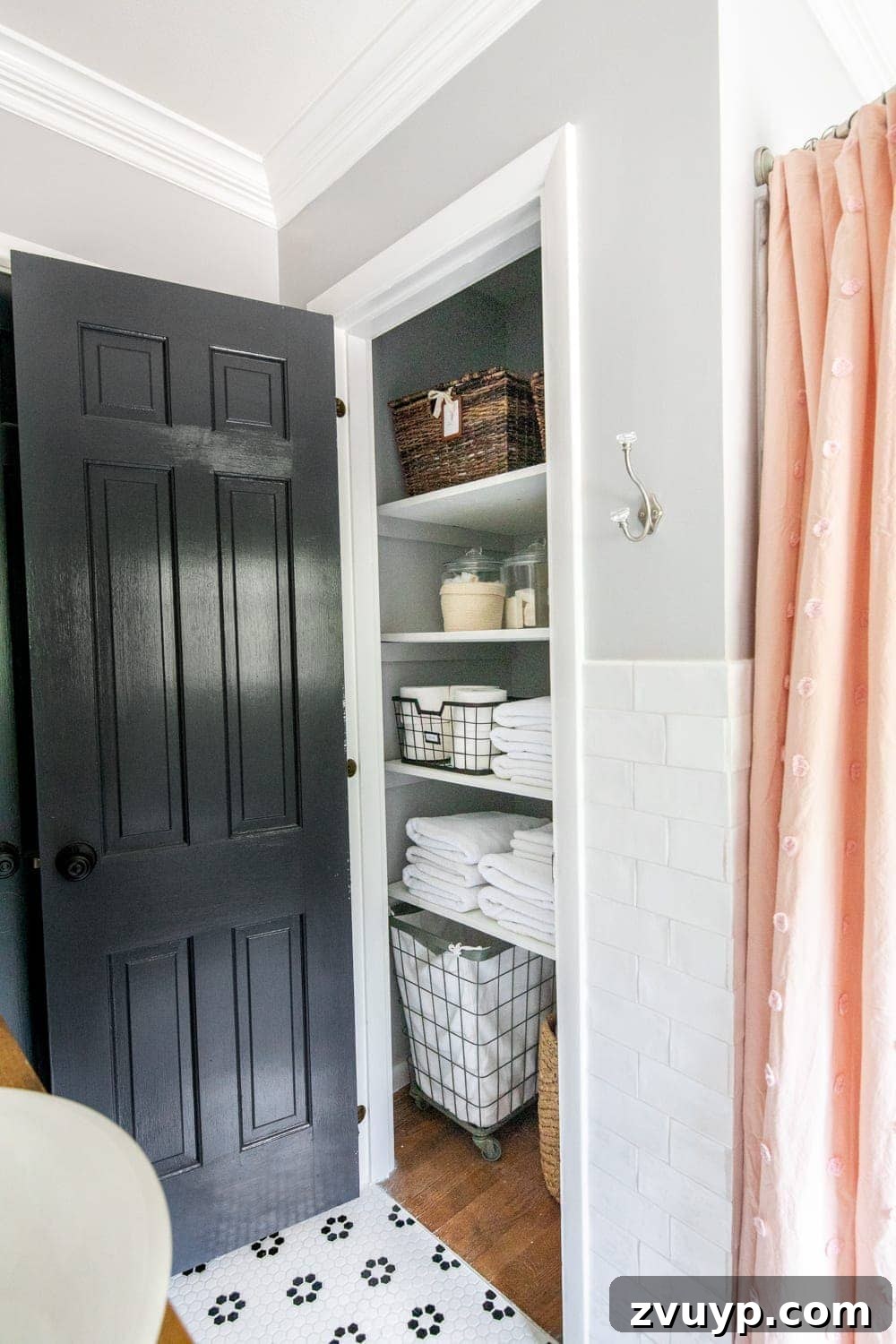 Unveiling the Ultimate Kids Bathroom Makeover 18 Well-organized linen closet in a kids bathroom with labeled baskets