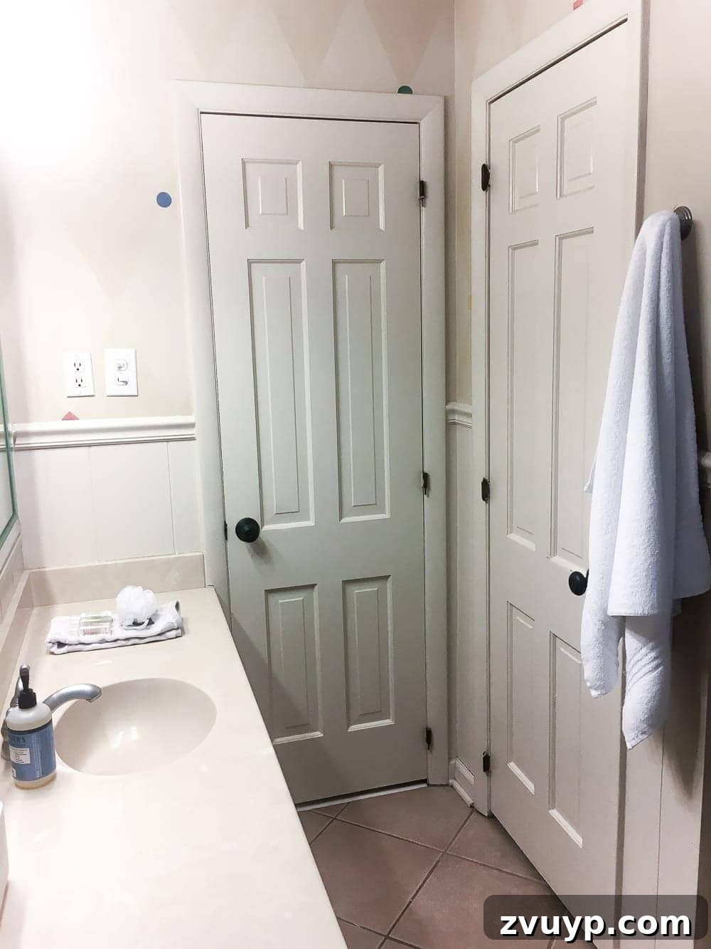 Unveiling the Ultimate Kids Bathroom Makeover 20 Before shot of the kids bathroom, highlighting the initial dated state