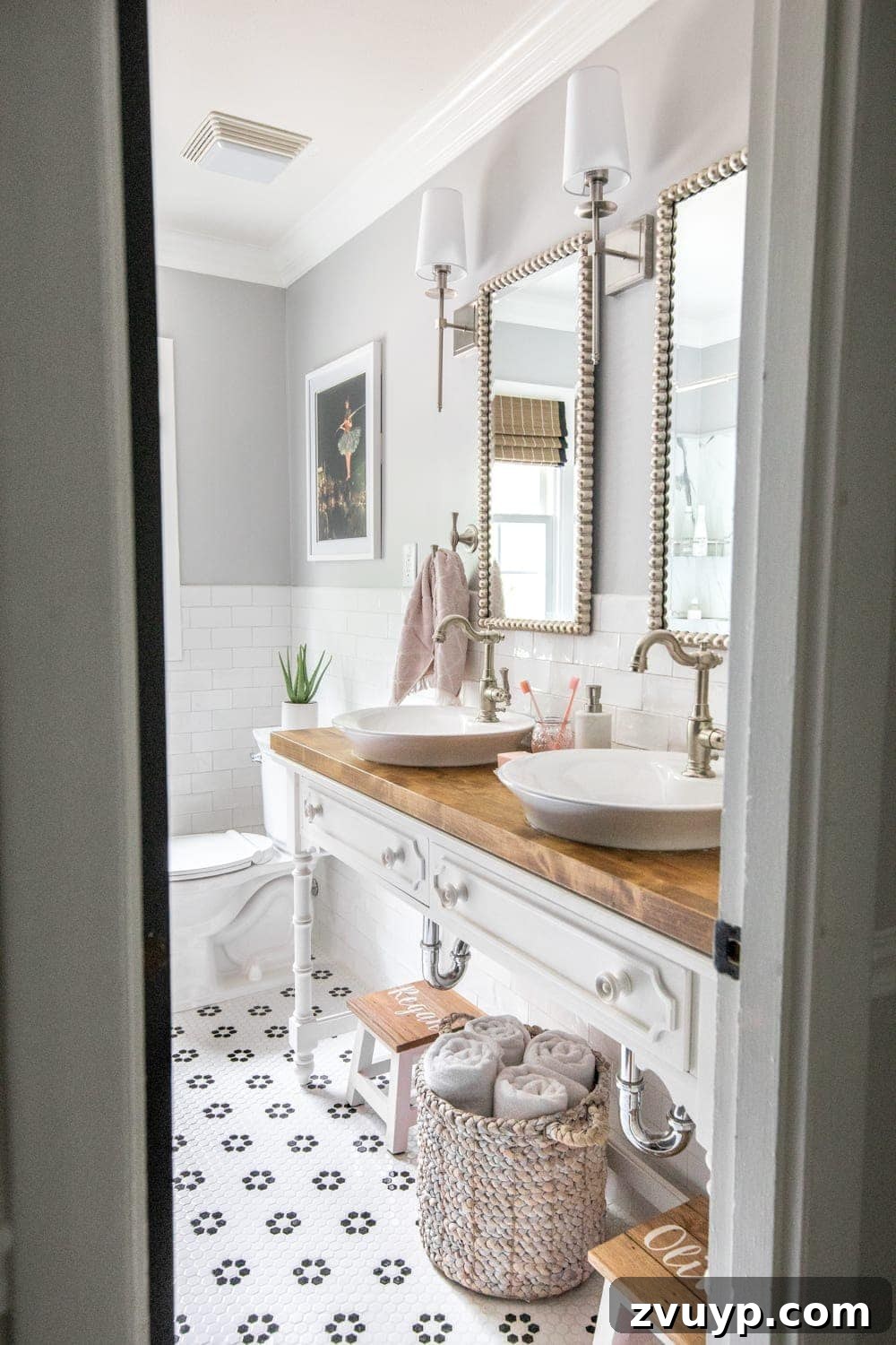Unveiling the Ultimate Kids Bathroom Makeover 5 Open vanity with vessel sinks and personalized step stools in a modern kids bathroom