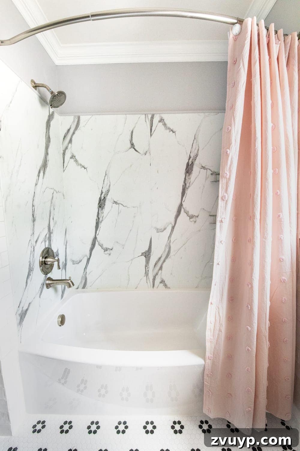 Unveiling the Ultimate Kids Bathroom Makeover 9 Curved tub and faux marble shower in a classic kids bathroom makeover