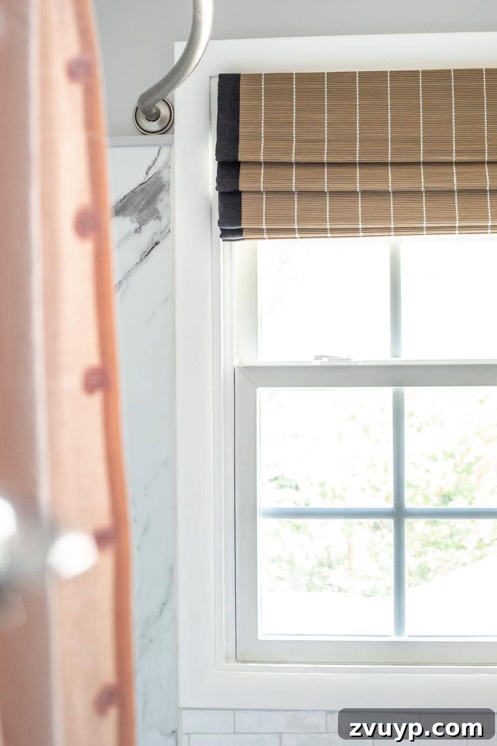 Woven Wood Window Shade: Capri Maple shade with privacy liner, complementing faux marble shower walls