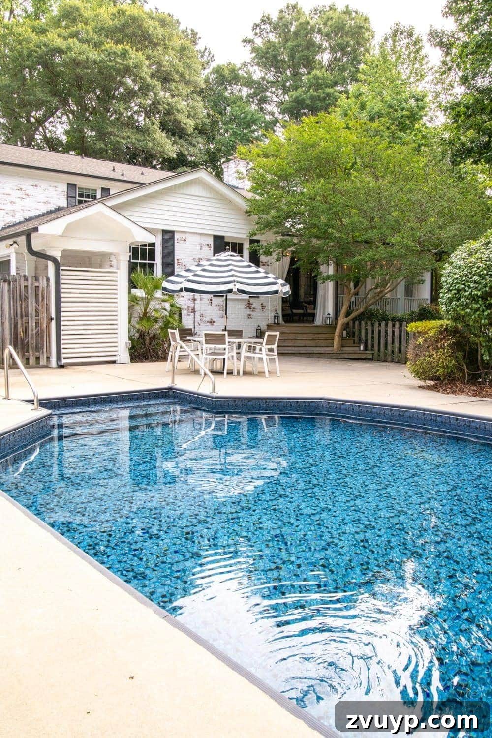 Our Pool's Stunning Liner Transformation 16 Swimming Pool Liner Makeover Reveal - After pool liner replacement and limewashed brick with Obsidian liner from GLI Pool Products TrueStone Collection