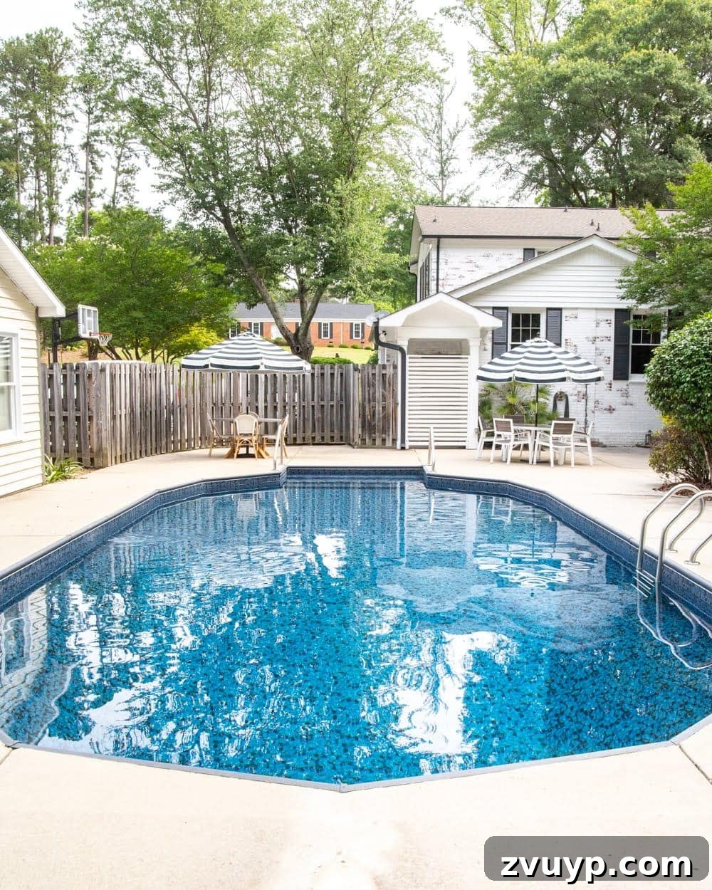 Our Pool's Stunning Liner Transformation 21 Swimming Pool Liner Makeover Reveal - Obsidian pool liner from GLI Pool Products TrueStone Collection and limewashed brick, showcasing the new look