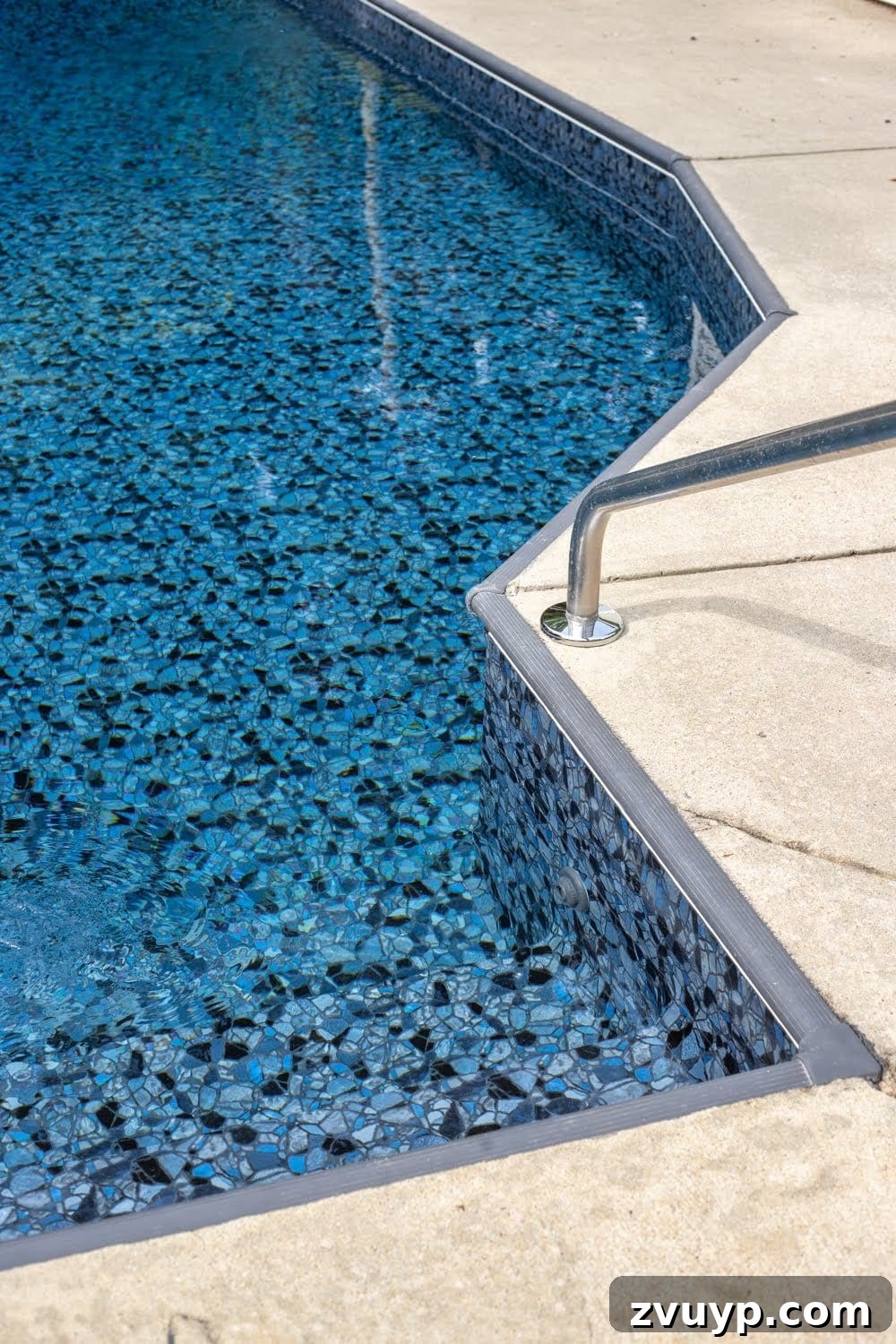 Our Pool's Stunning Liner Transformation 6 Stunning Pool Liner Makeover featuring TrueStone Collection - Obsidian from GLI Pool Products with charcoal gray painted coping strip