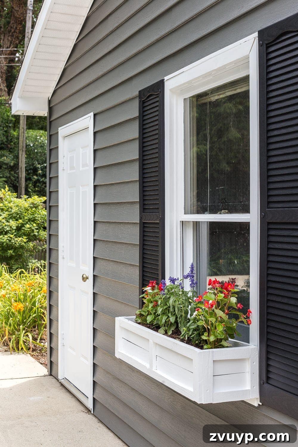 Refresh Your Exterior: Vinyl Siding Painting and Pool Shed Makeover 8 Pool shed exterior makeover showcasing newly painted vinyl siding, DIY window boxes, and updated hardware