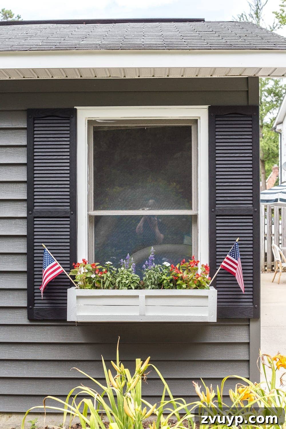 From Scraps to Blooms Window Box 25 DIY window box on house exterior with patriotic flowers