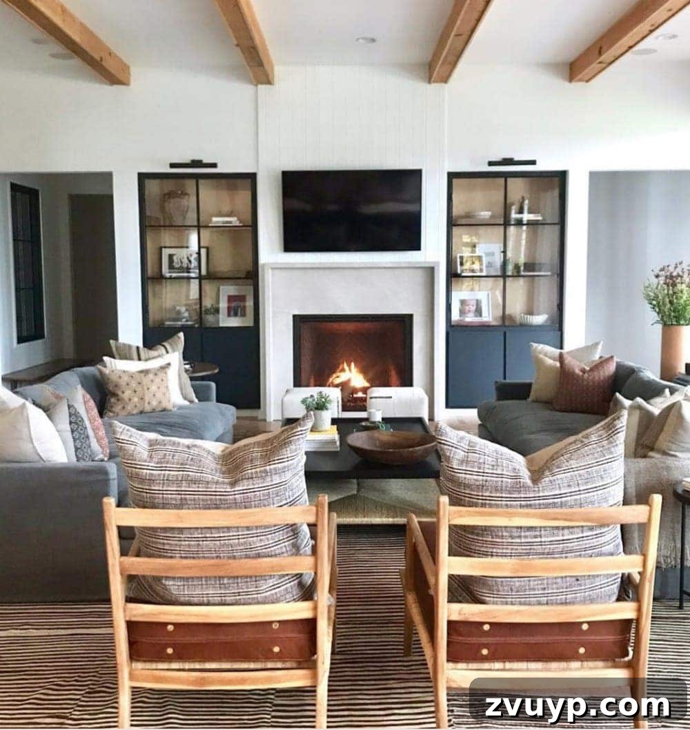 Beyond the Screen: Creative Ways to Style Your TV Area 11 Television flanked by elegant cabinets providing balance and hidden storage.