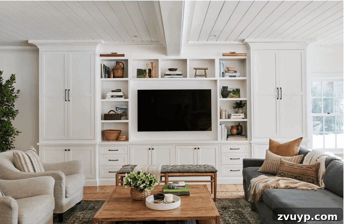 Beyond the Screen: Creative Ways to Style Your TV Area 13 DIY built-ins made from IKEA bookcases, seamlessly integrating a television.